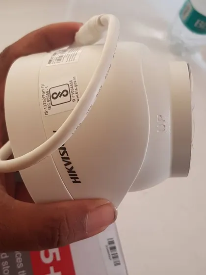 The back of a Hikvision dome camera, showing the branding and model details.
