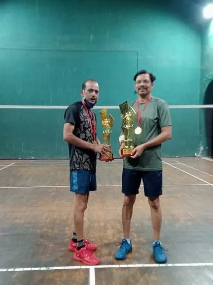 Men's Doubles Group D & E winners and runners-up.