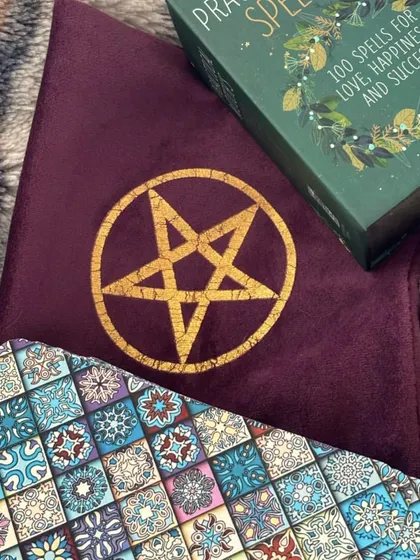 This is where the magic is stored. My tarot pouch, along with a special spell book, keeps my decks safe and charged. The pentacle symbol offers protection and connection to the elements.