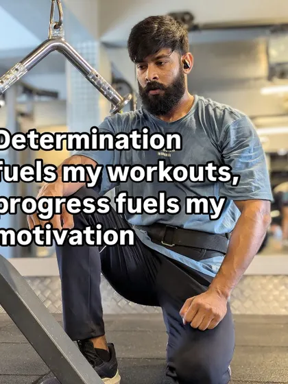 "Determination fuels my workouts, progress fuels my motivation." A moment of rest and focus between sets.