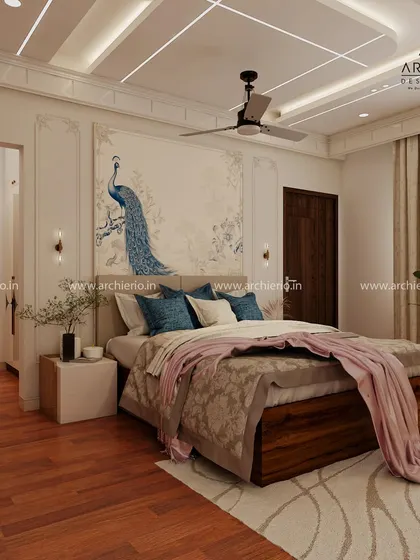 Another perspective of the peacock-themed bedroom, showing the elegant wall mouldings and the flow into the walk-in closet area. The design feels open and luxurious.