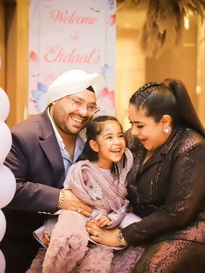 A candid family photo filled with genuine smiles and laughter. We believe these unposed moments are the ones you'll cherish most.