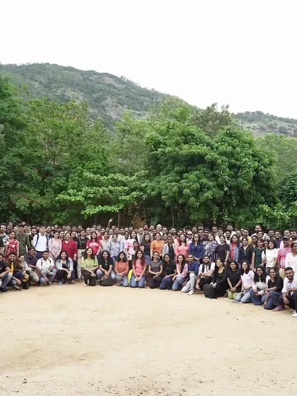 Capturing the full group from another perspective. Our grounds offer plenty of scenic spots for memorable team photos.