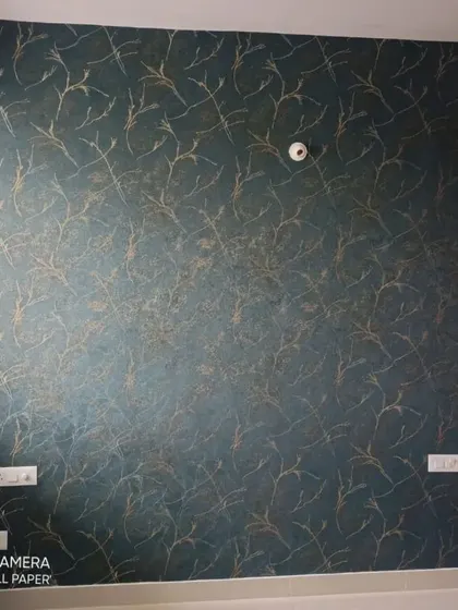 A dark teal wallpaper with a subtle, scratch-like texture in gold. This design adds depth and a touch of understated luxury, perfect for a bedroom or living room accent wall.