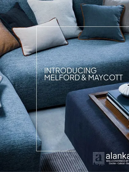 Introducing the Melford & Maycott fabric collections. This image showcases a custom sofa upholstered in these versatile fabrics, which offer a beautiful texture and a rich color palette for both drapes and furniture.