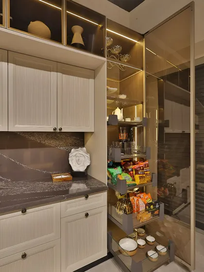 Here, the tall pantry unit with a pull-out system is on full display. This is a great example of how I integrate smart storage to make a kitchen highly functional without sacrificing style.