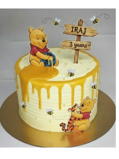This Winnie the Pooh cake is a butterscotch caramel delight. The honey drip and cute bee decorations add to the charm of this popular theme for a 3rd birthday.