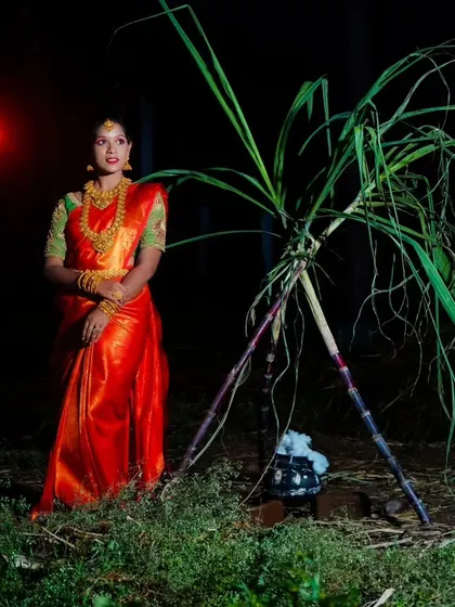 A full-length view of the Pongal celebration look, featuring a bright silk saree and a complete temple jewellery set available for hire.