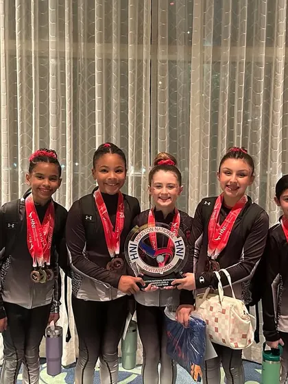 Our Level 6 Optional Team with their 2nd place team award at the HNI meet in Moody Gardens. Their collective scores and individual wins made for an awesome weekend.