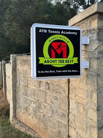 The official sign for the ATB Tennis Academy at our Yelahanka location. Our motto is simple: "To be the Best, Train with the Best."