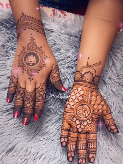 A lovely pair of hands showing two different styles for a baby shower, one with a 'Boy or Girl' theme and the other with a classic lotus design.