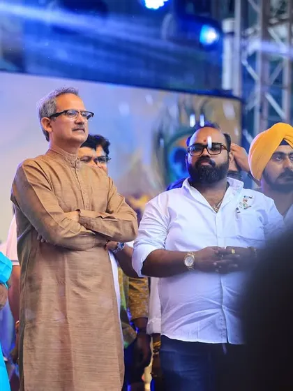 Our team members and event coordinators overseeing the proceedings from the stage. We are always on site to ensure every detail of the event runs smoothly.