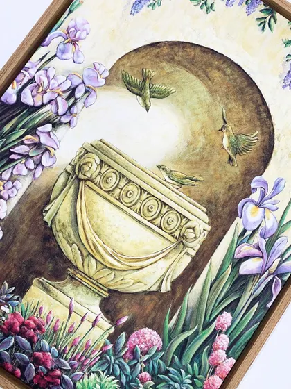 A charming artwork titled "Garden Alcove I" by Elizabeth Wright, featuring birds in a blooming garden, framed in a natural veneer wooden frame.