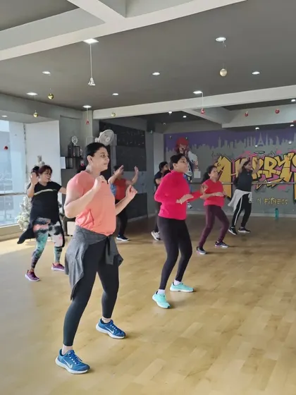 Our members learning a new routine during a Zumba session. The focus is always on having fun while moving.