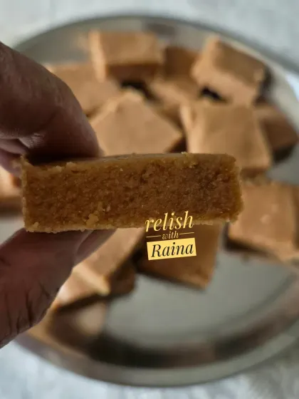 Showing the perfect thickness and texture of a piece of Sukhdi. It's a wholesome sweet that can be enjoyed all year round.