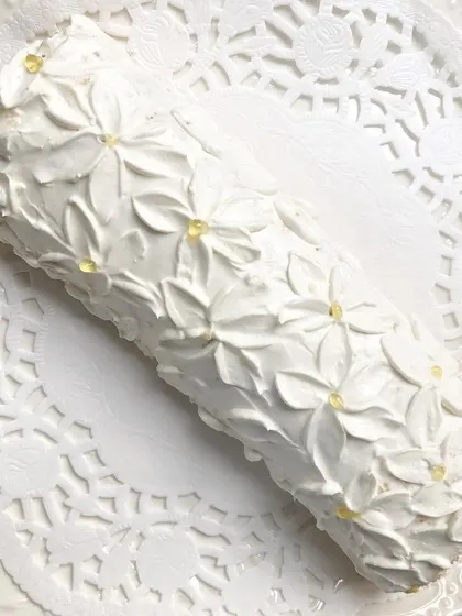 A classic pineapple jam roll, but make it glam! I used a palette knife to create this textured, floral-inspired pattern on the outside.