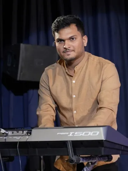 A collection of photos from our keyboard ensemble's performance of 'Chand Sifarish'. These shots capture the focus and joy of our young musicians and their teachers on stage.