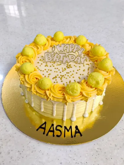 Indian-ness in a cake. This is my fresh Rasmalai cake, decorated with swirls of saffron-infused cream and topped with soft rasmalai pieces and gold sprinkles.