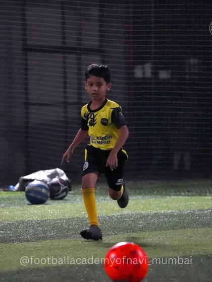 Another one of our young talents running with the ball. My training philosophy is built on repetition and dedication to master the fundamentals.