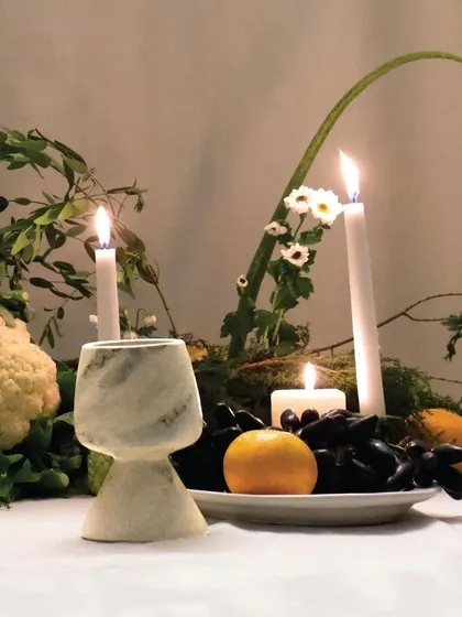 The 'Nari' goblet, with its marbled glaze, adds a touch of modern elegance to the tablescape. It's a beautiful example of our commitment to harmony and uniqueness.