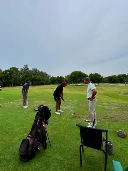 A small group lesson in progress. Our coach observes and provides feedback to multiple students, creating a collaborative and supportive learning environment.