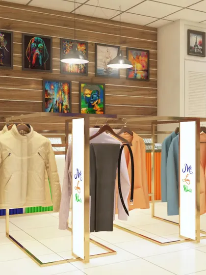 For this boutique in the British Virgin Islands, I designed custom clothing racks with integrated branding and lighting. The layout is planned for easy customer flow, with a feature wall of wood paneling and art to create a warm, modern atmosphere.