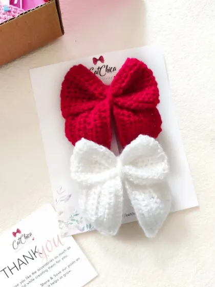 A simple and sweet pair of our sailor bows in red and white, shown with our thank you card.