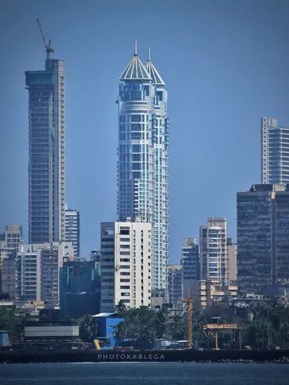 A clear, daytime shot of the Twin Towers, one of the most recognizable residential skyscrapers in Mumbai.