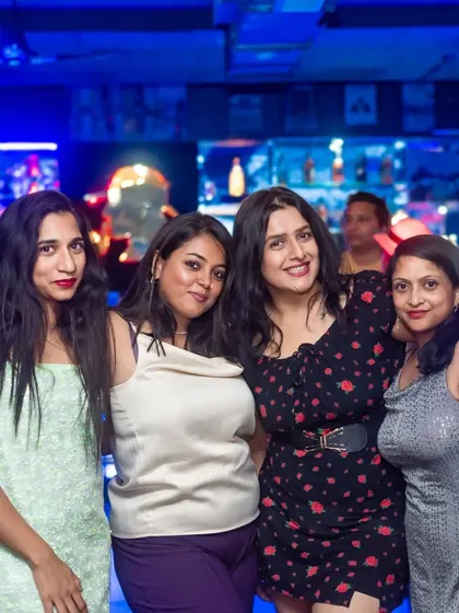 A snapshot of a great night with the girls. The energy here is perfect for letting loose and enjoying a well-deserved party.