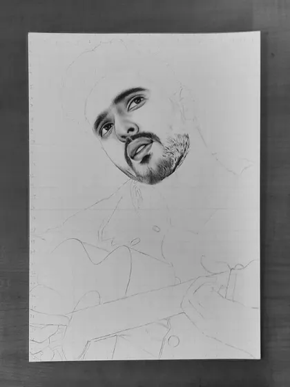 Follow the 90-hour journey of my Armaan Malik portrait. These progress shots show how I use the grid method to ensure accuracy and build up the face, hair, and clothing textures.