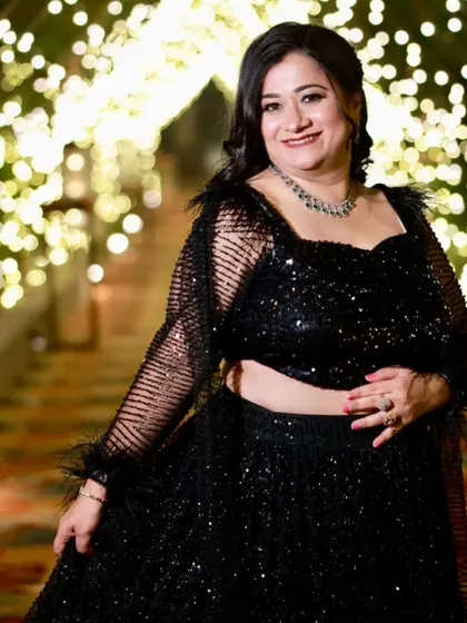 A client from Rohtak looking stunning in a black sequin outfit for a party. I created a glamorous look with a focus on glowing skin.