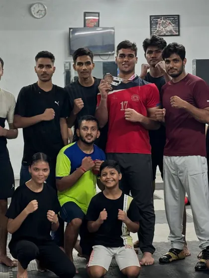 Another group photo celebrating Vaibhav's success. The support of the team is a huge part of every individual achievement.