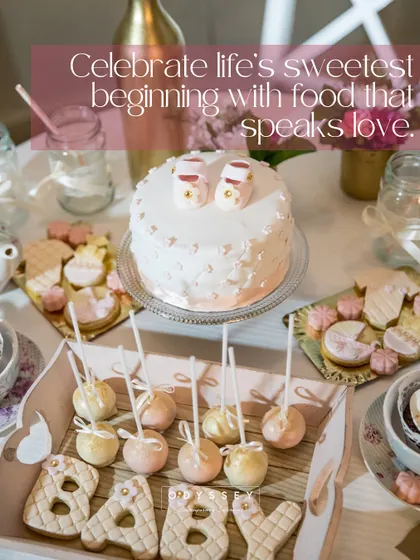 We craft sweet stories for life's most precious moments. This adorable baby shower dessert table features a custom cake with tiny booties, themed cake pops, and "BABY" cookies, all designed to create a heartwarming and delicious celebration.