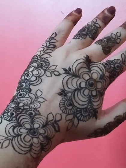 The same bold floral design as the previous image, but with only the linework done. This shows the first step in creating these striking, graphic-style floral patterns.