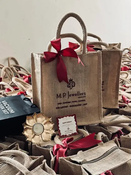 A festive setup featuring our custom jute bags and other gift items. Perfect for Diwali or other celebrations.