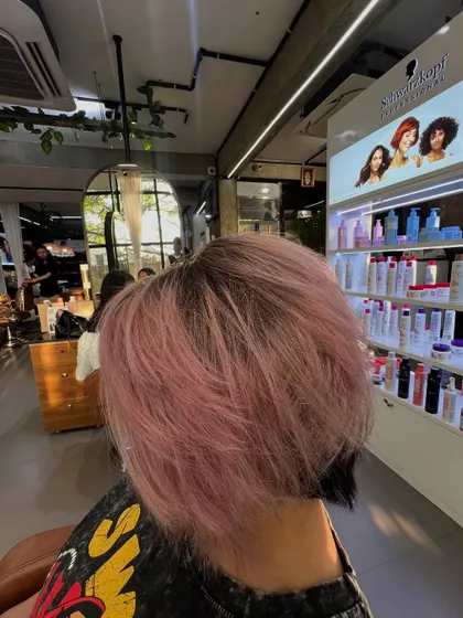 Another angle of the baby pink look, showing how the color is concentrated on the top layers for a modern effect.