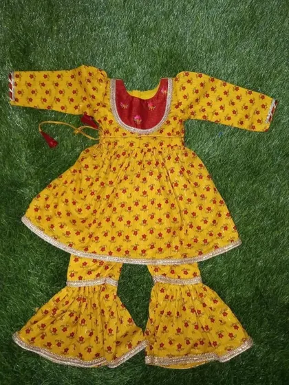A traditional sharara set I made for a 9-month-old baby. The outfit is made from soft cotton with a floral print.