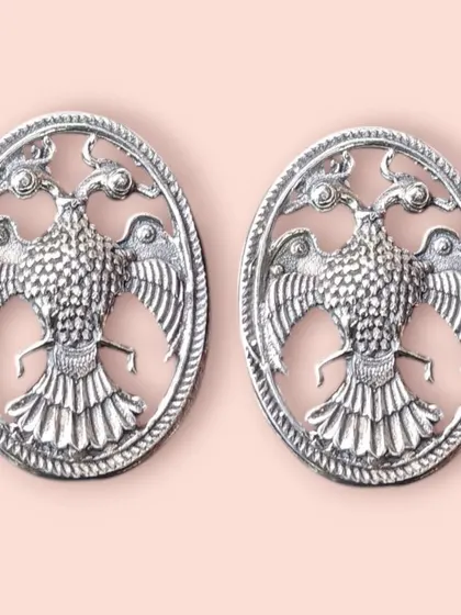 Nothing is more worthwhile than buying pure silver earrings. This pair features a powerful double-headed eagle motif, a symbol of strength and heritage, crafted with intricate detail in 925 sterling silver.