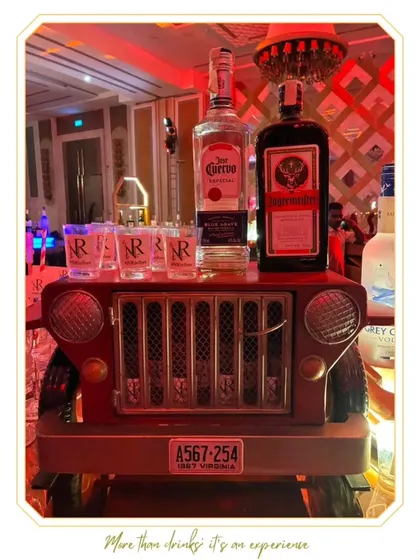 We love incorporating unique, thematic elements into our bar designs. This custom-built jeep grille shot dispenser adds a playful and memorable touch to the bar experience.