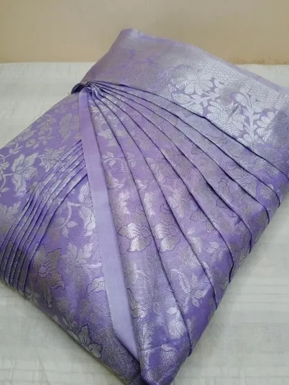 This lavender saree with silver brocade is now ready to wear. My pleating and box folding service makes it easy to store and drape.