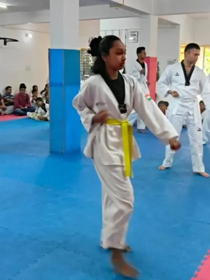 Students practicing their forms during a belt exam.