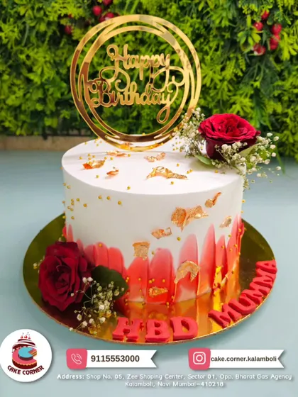An elegant birthday cake for Mumma, decorated with fresh red roses and gold leaf. The red brushstroke effect adds a modern artistic touch.