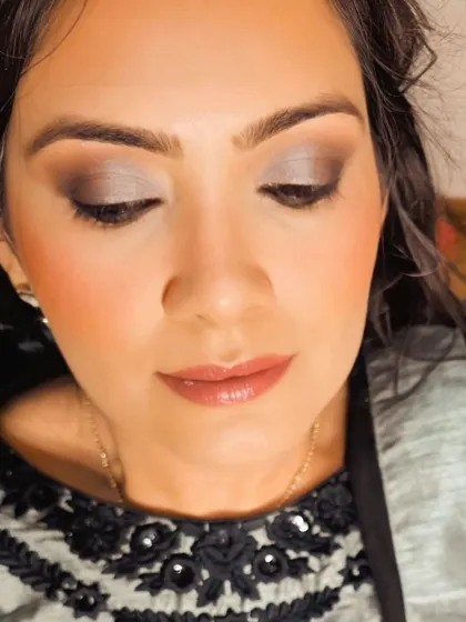 This subtle glam look is all about effortless beauty. The makeup is polished and refined, perfect for a client who wants to look her best with confidence.