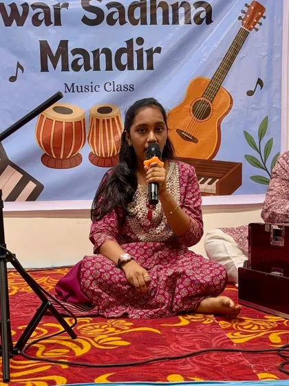 An adult student presenting her performance. It is never too late to learn, and we are so proud of our adult learners who embrace their passion for music with such dedication.