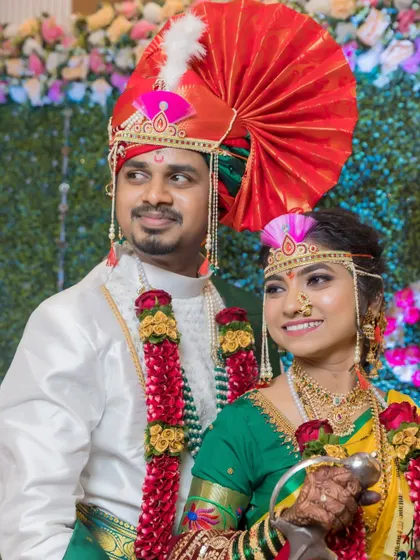 The couple looks away, sharing a moment of quiet reflection and happiness after their wedding.