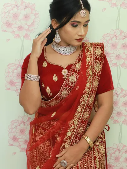 A closer look at the velvet blouse and sheer dupatta. The outfit is paired with diamond-style jewelry, showing how versatile it can be.