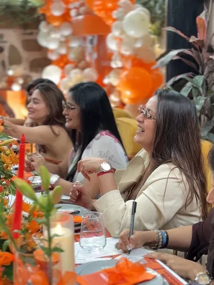Guests writing their wishes for the baby, a heartfelt activity that everyone enjoyed.