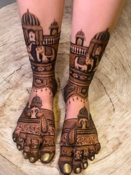 A creative design for the feet featuring cats in a palace setting, showing that I can incorporate any animal or pet into your personalized mehndi.