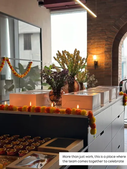 More than just a place for work, I believe a studio should be a place where the team comes together to celebrate. Here, our material island is decorated with flowers and candles for a team event, showing the versatility of the space.