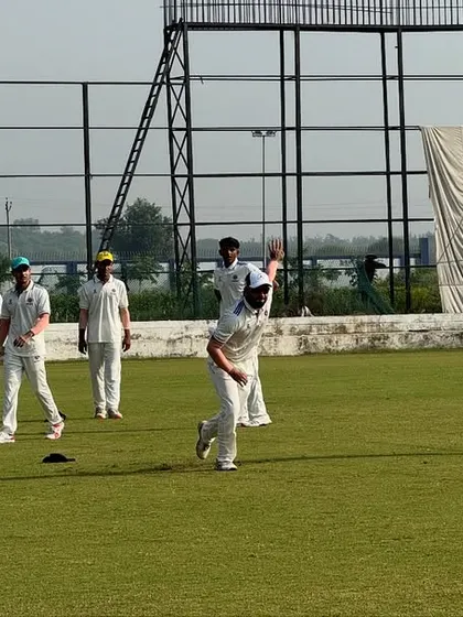 A dynamic fielding scene from a competitive match. Our training emphasizes all-round excellence, ensuring our players are sharp and agile in every department of the game.